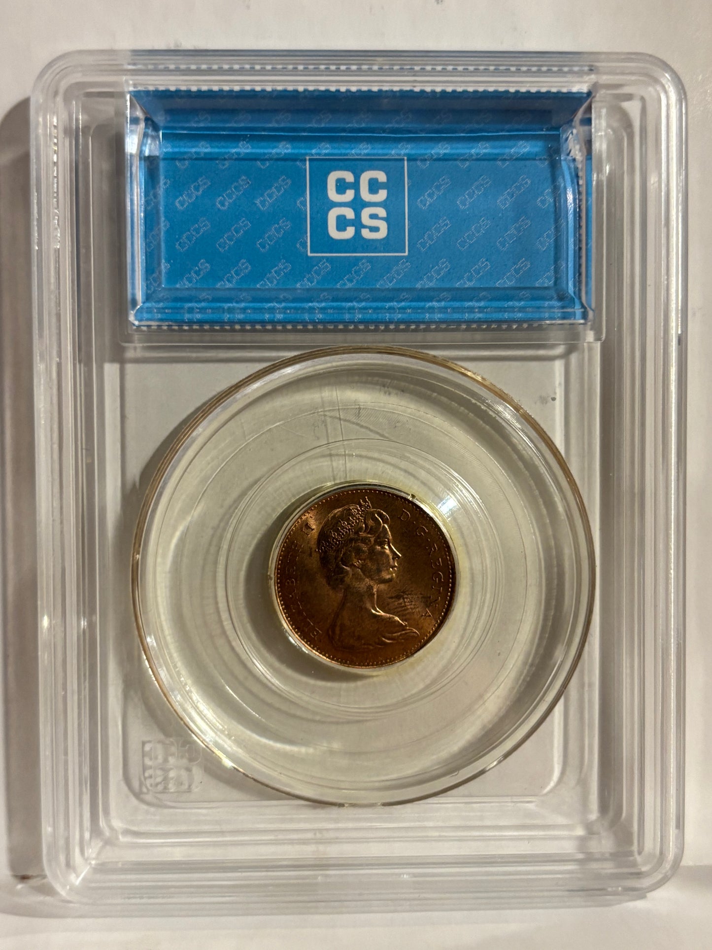 1977 Canada 1 Cent Error Partial Brokage. CCCS Graded MS64