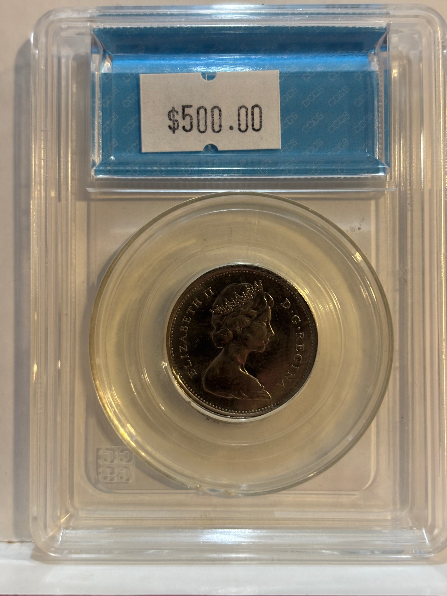 1968 Canada 25 Cents Error. Partial Brokage on Broadstruck. CCCS graded MS63