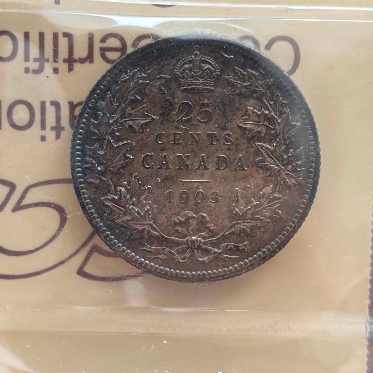 1903 Canadian 25 Cents — reverse showing 25 CENTS CANADA 1903 maple wreath in ICCS holder