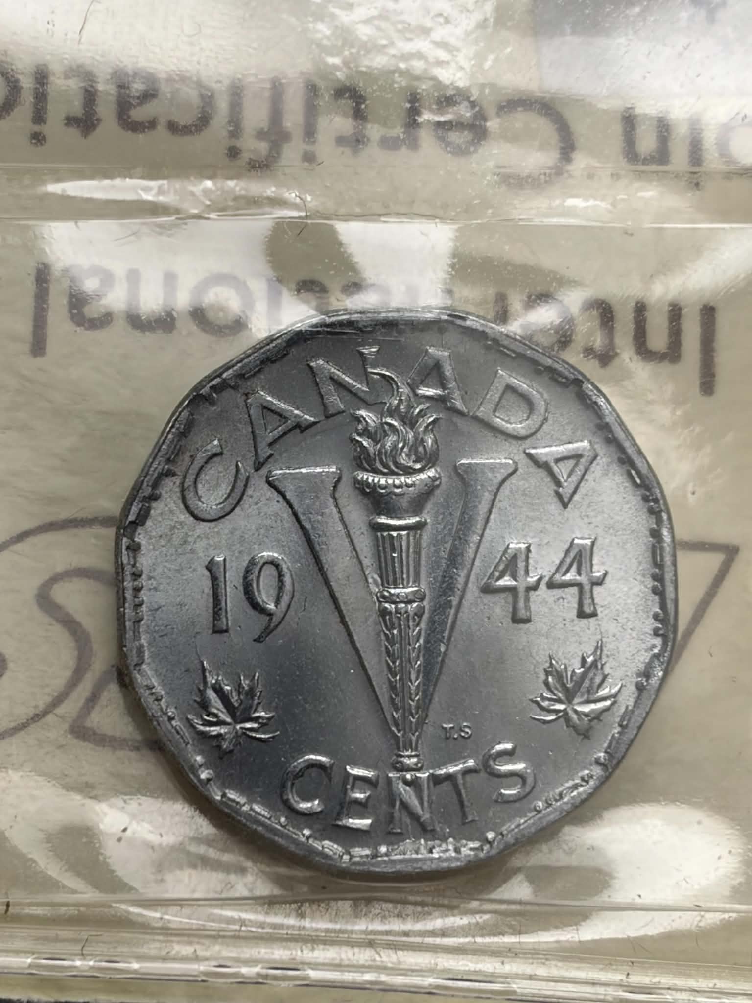 1944 Canadian 5 Cent Victory Nickel — reverse showing V for Victory design with torch and maple leaves