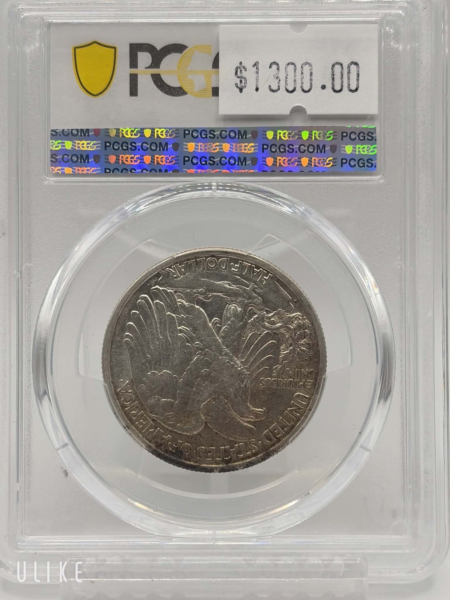 1928-S Walking Liberty Half Dollar — reverse showing eagle design in PCGS holder, AU-53