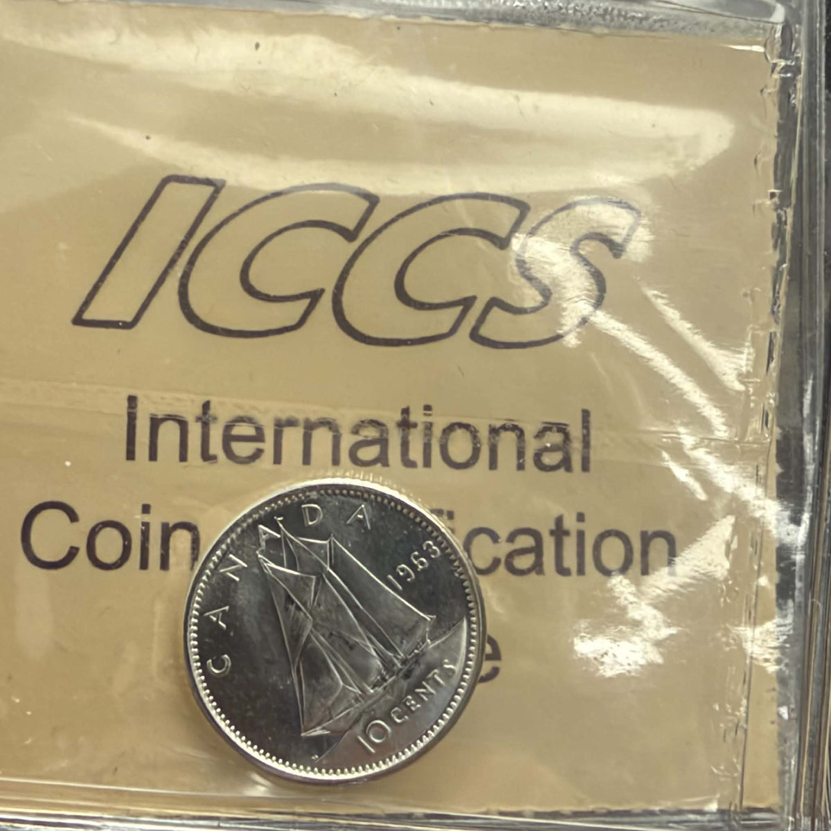 1963 Canadian dime Elizabeth II obverse in ICCS MS66 holder, certification XOU 778