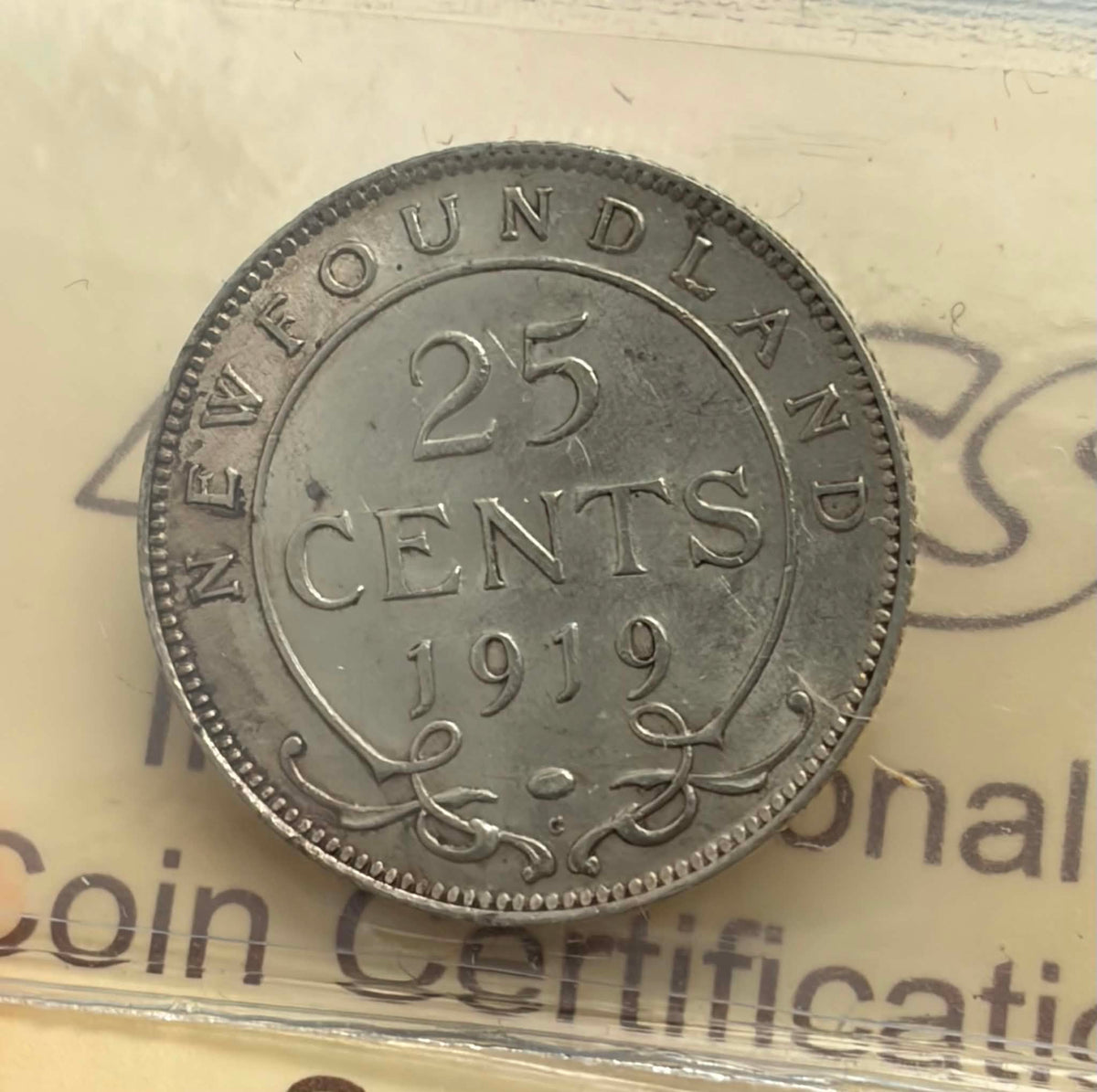 1919C Newfoundland 25 Cents — reverse showing 25 CENTS NEWFOUNDLAND 1919 in ICCS holder