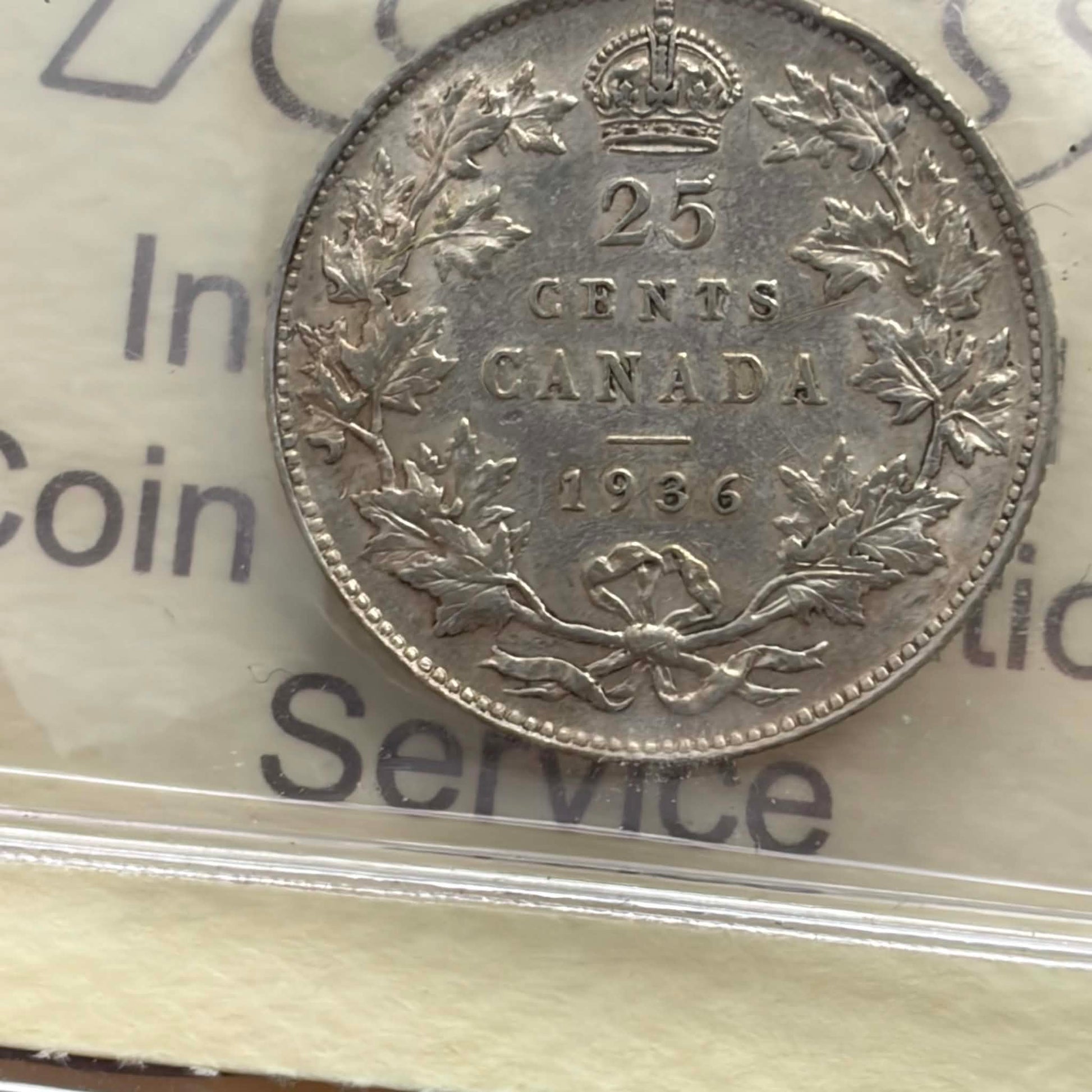 1936 Canadian 25 Cents — reverse showing 25 CENTS CANADA 1936 maple wreath in ICCS holder