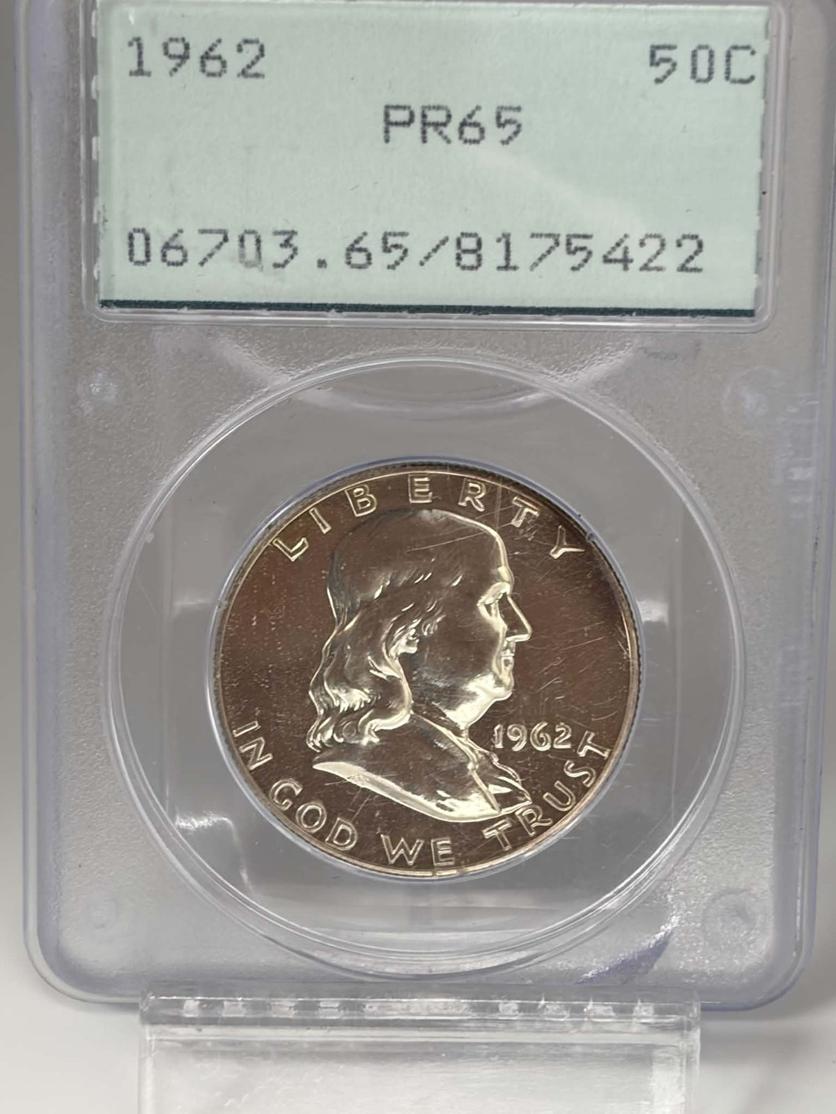 1962 Franklin half dollar obverse in green-label PCGS PR65 holder, certification 8175422