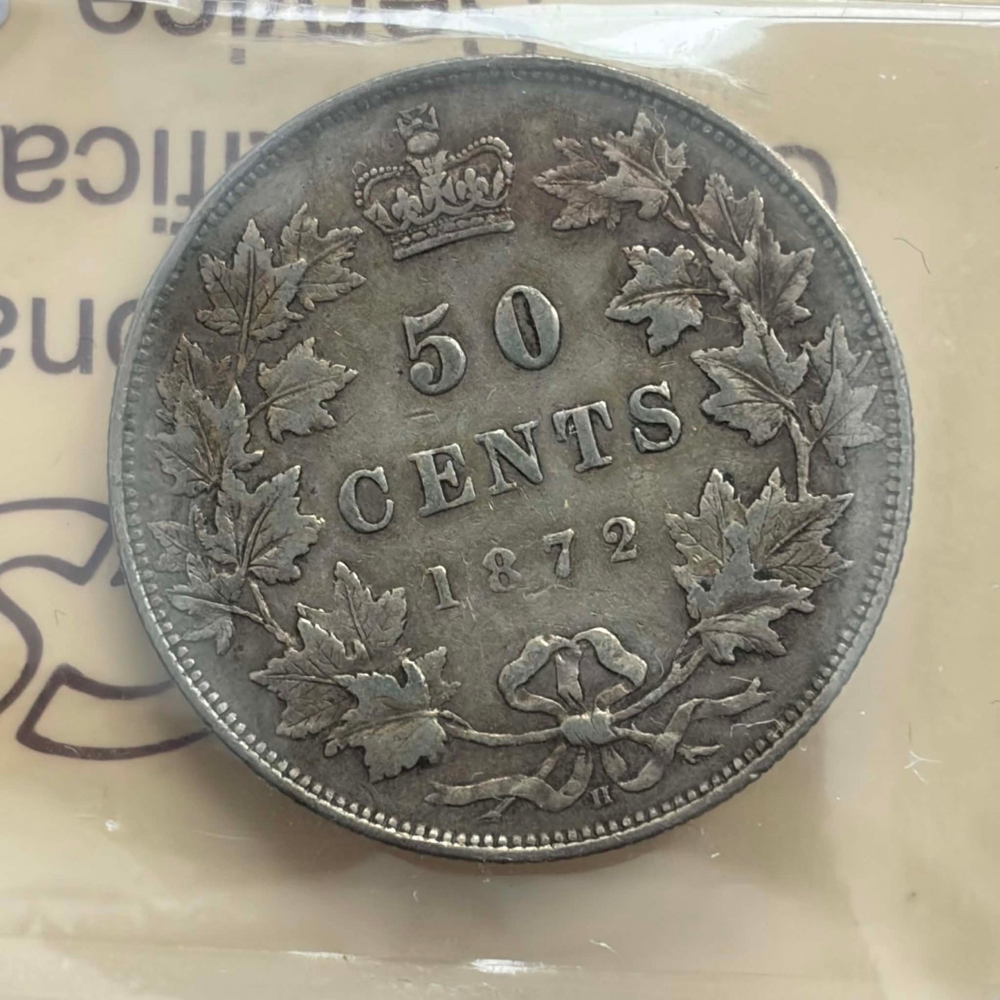 1872H Canadian 50 Cents — reverse showing 50 CENTS 1872 maple wreath in ICCS holder