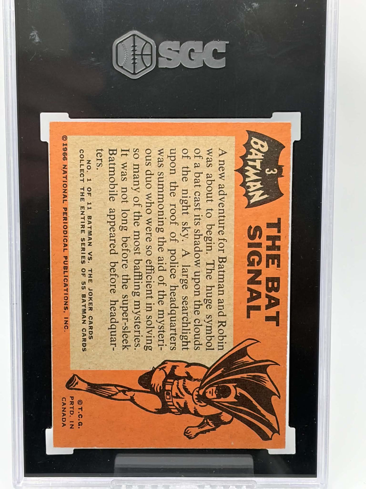 Reverse of 1966 Topps Batman #3 The Bat Signal showing PRTD. IN CANADA marking