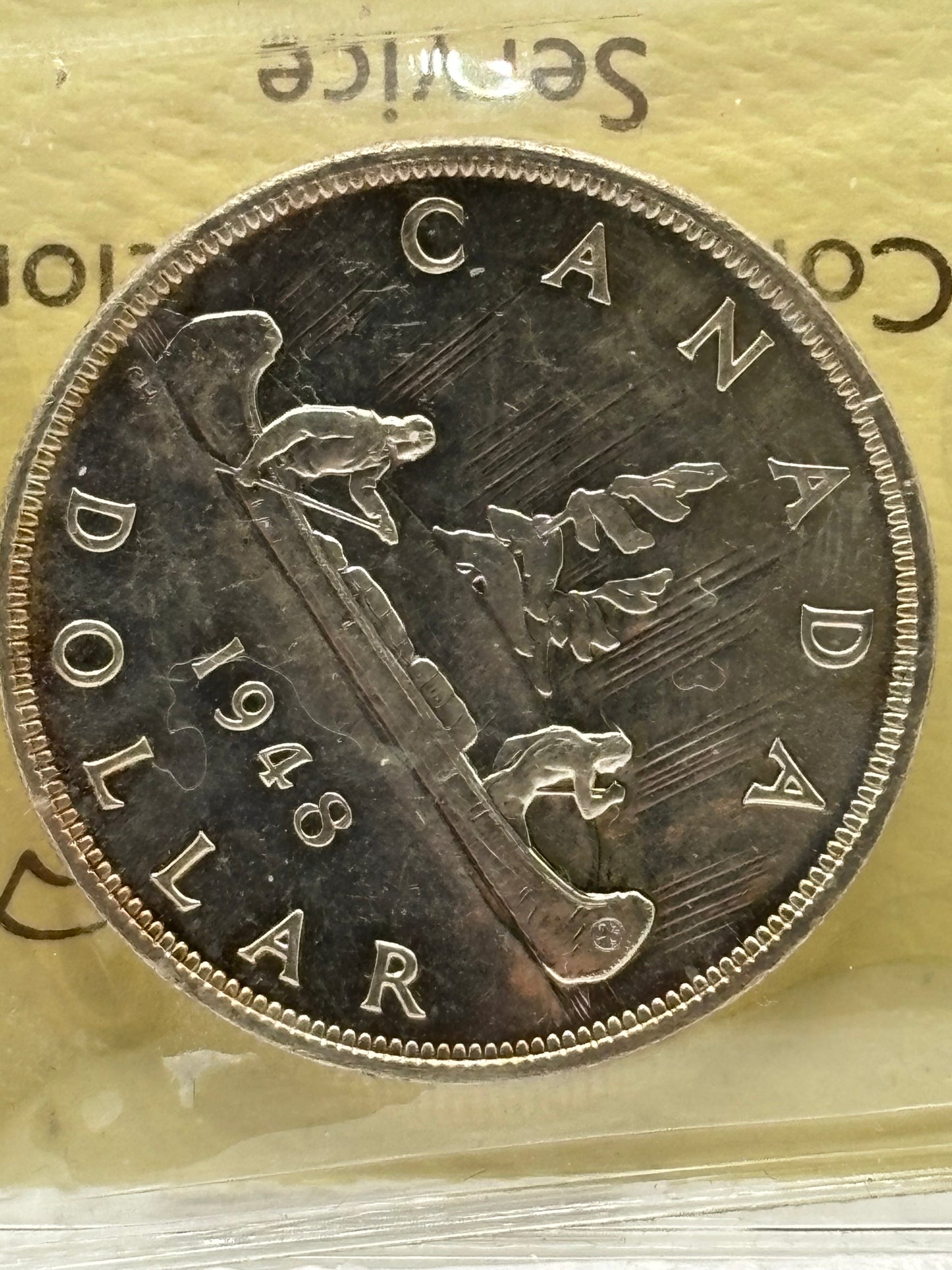 1948 Canada $1. ICCS graded MS-62