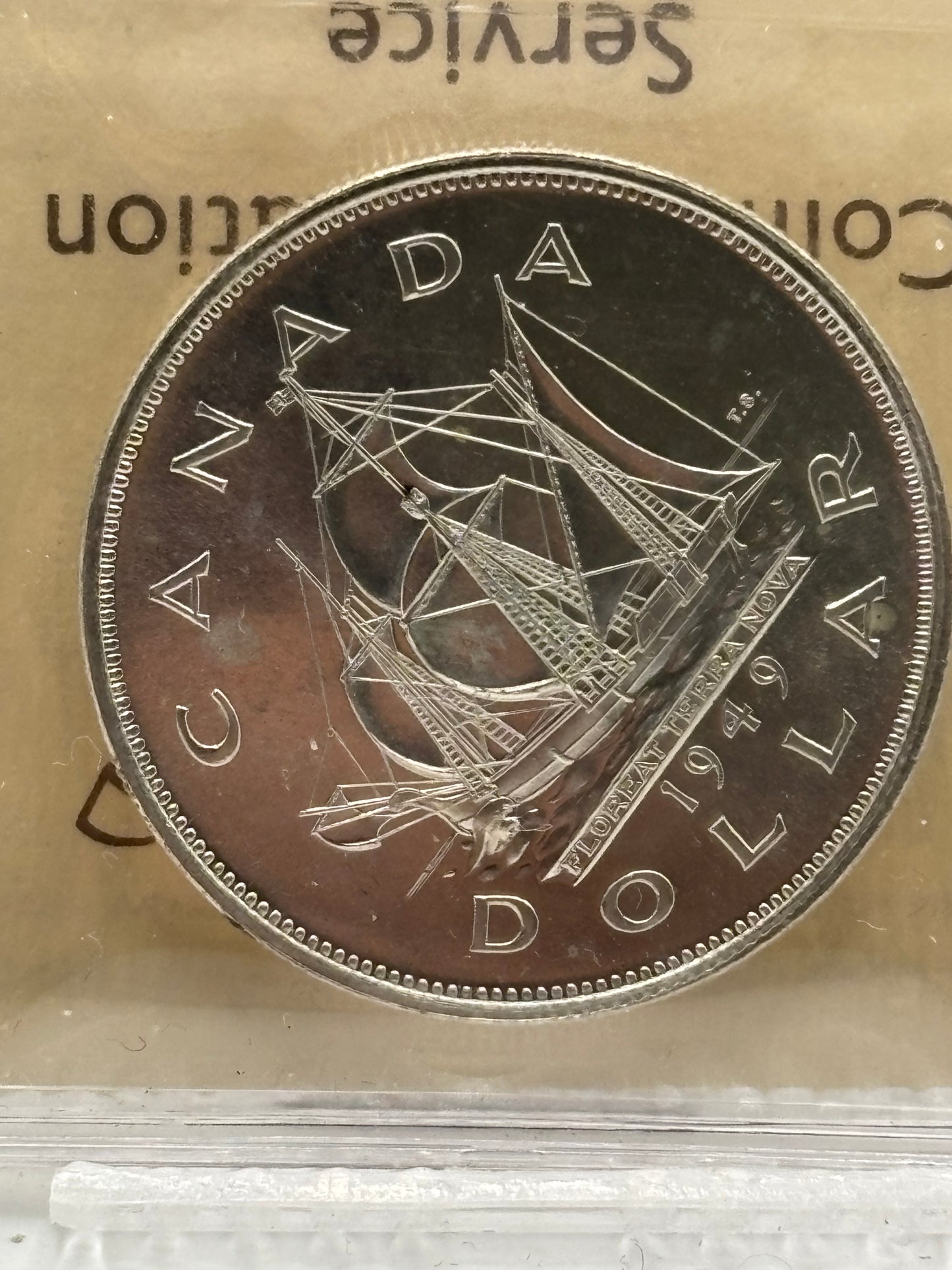 1949 Canada $1. ICCS graded MS-65