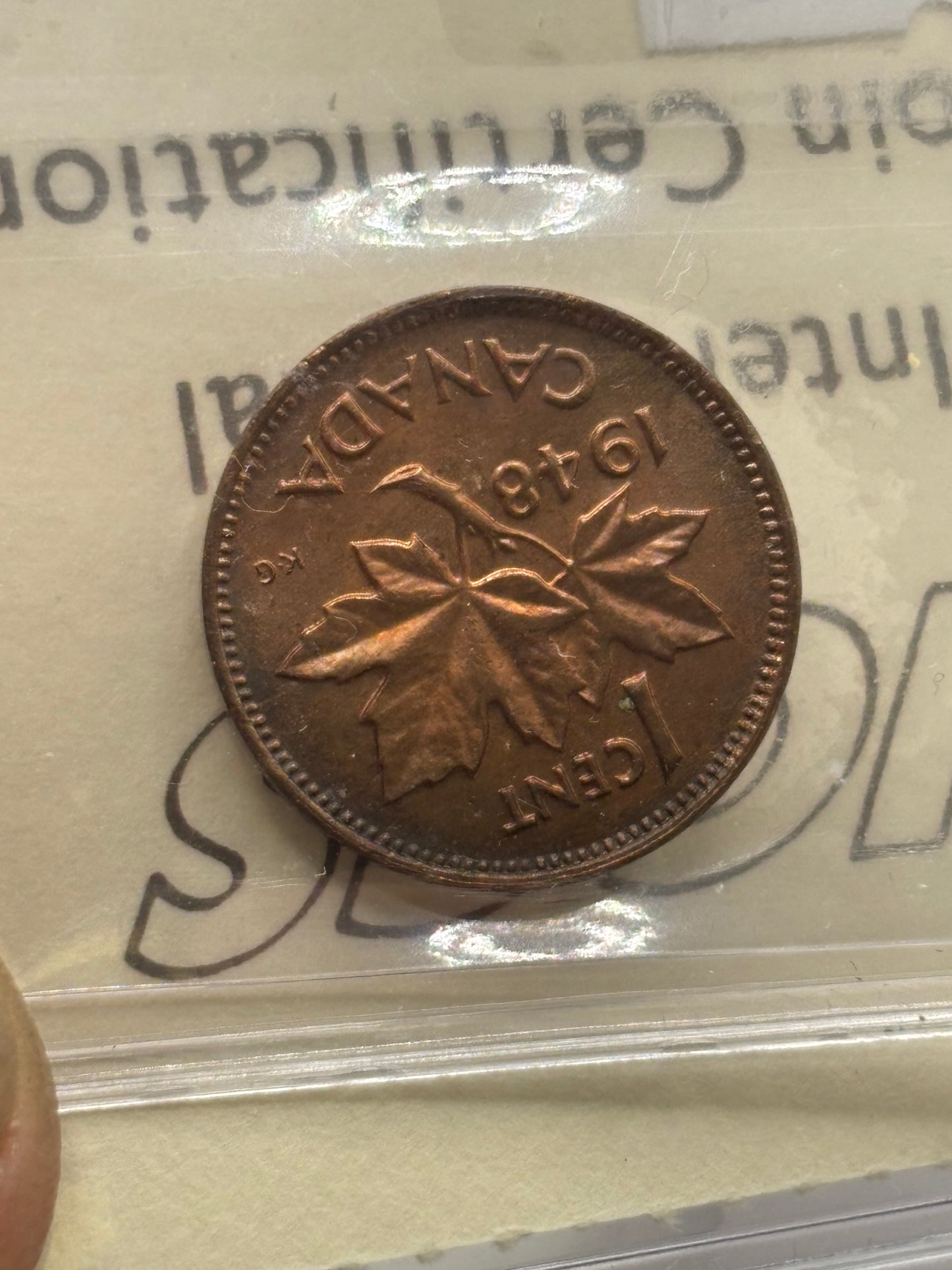 1948 Canada $0.01. A off Denticle. ICCS graded MS-63 Red