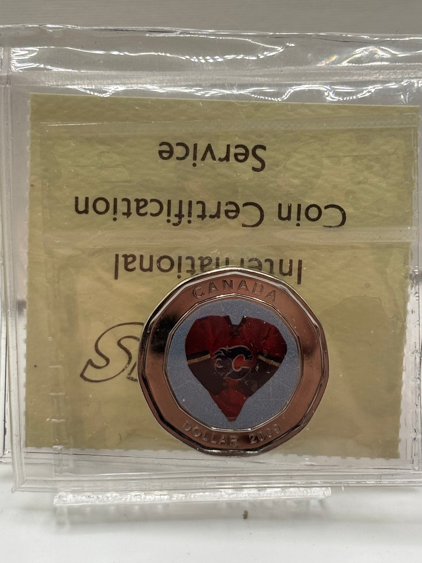 2009 Canada $1 Calgary Jersey NBU. ICCS graded MS-66