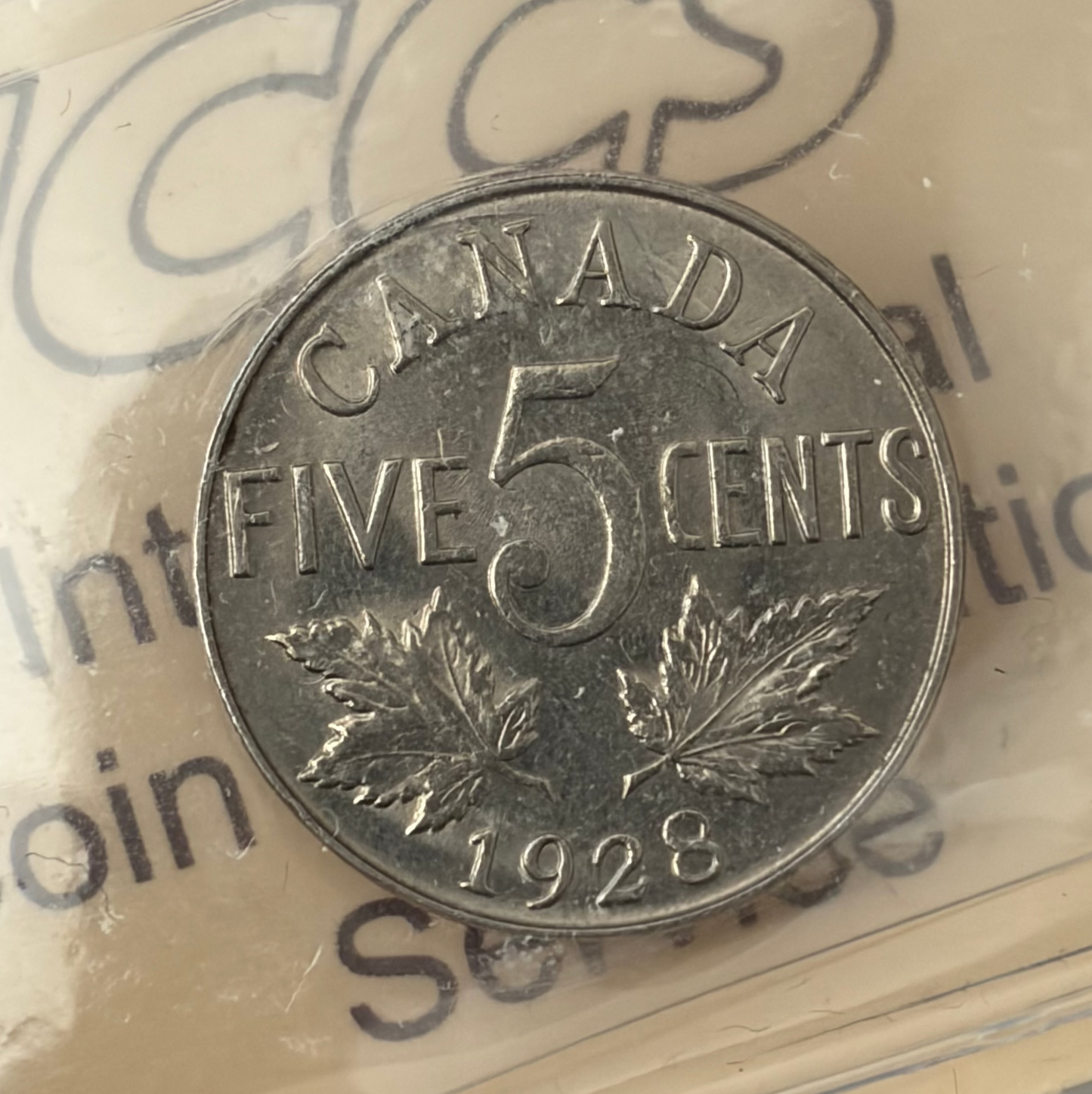 1928 Canada 5 Cents | ICCS MS-62 | King George V Nickel. Strong 8 Bead Strike!