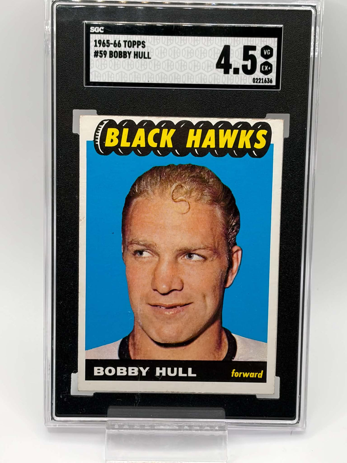 1965-66 Topps #59 Bobby Hull card reverse showing bilingual player notes and statistics