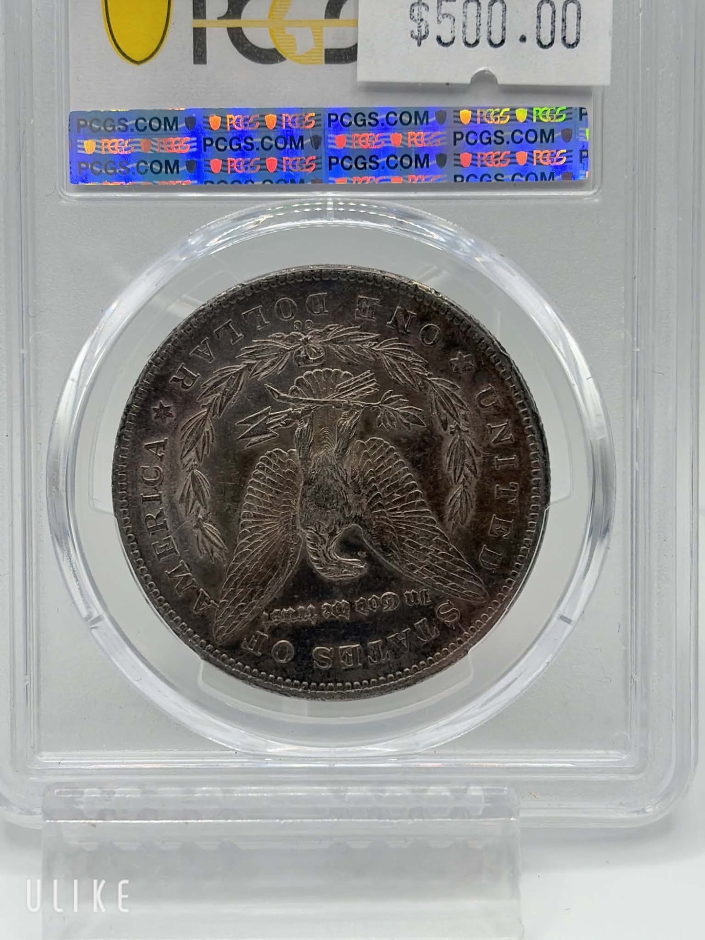 1878-CC Morgan Dollar — reverse showing heraldic eagle and CC mintmark with original toning in PCGS holder, AU-55