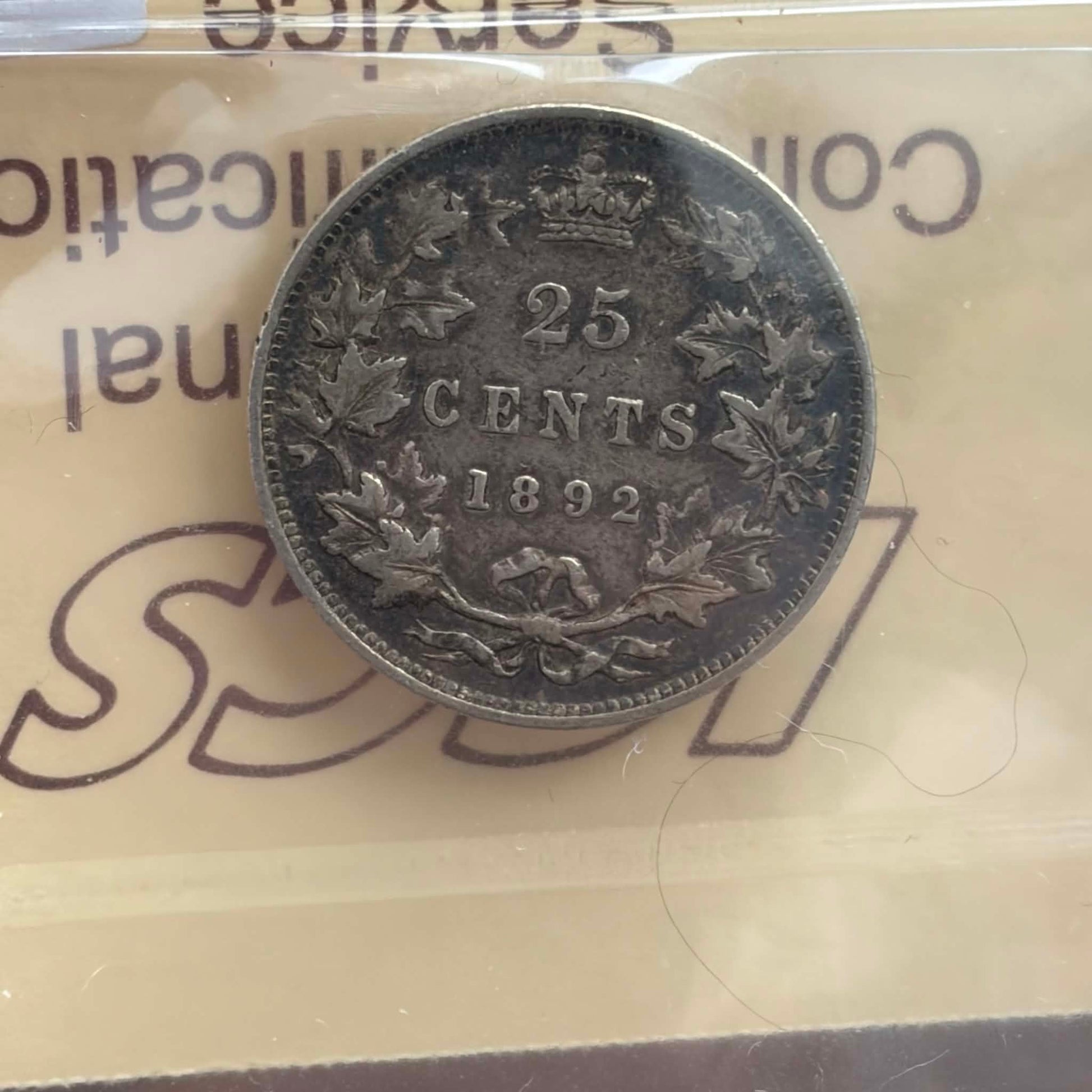1892 Canadian 25 Cents — reverse showing 25 CENTS maple wreath 1892 in ICCS holder