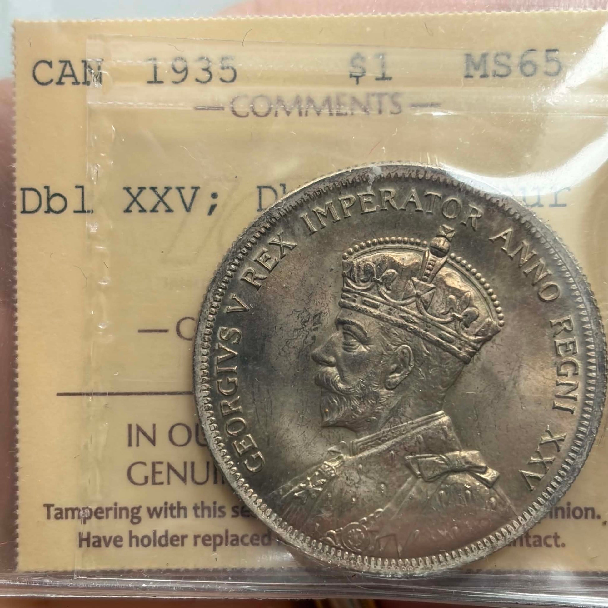1935 Canadian Silver Dollar — obverse showing George V Silver Jubilee portrait ANNO REGNI XXV in ICCS holder