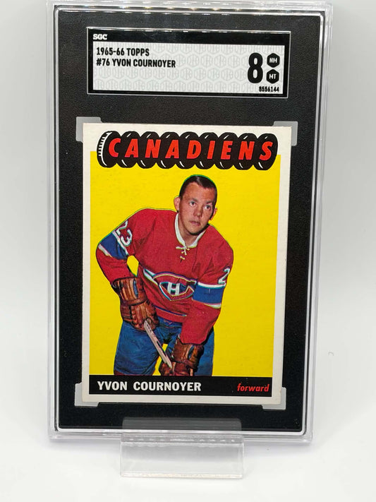 1965-66 Topps #76 Yvon Cournoyer card reverse with bilingual player notes and 1964-65 statistics