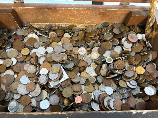 Representative bulk assortment of mixed world coins sold by the pound; actual selection varies