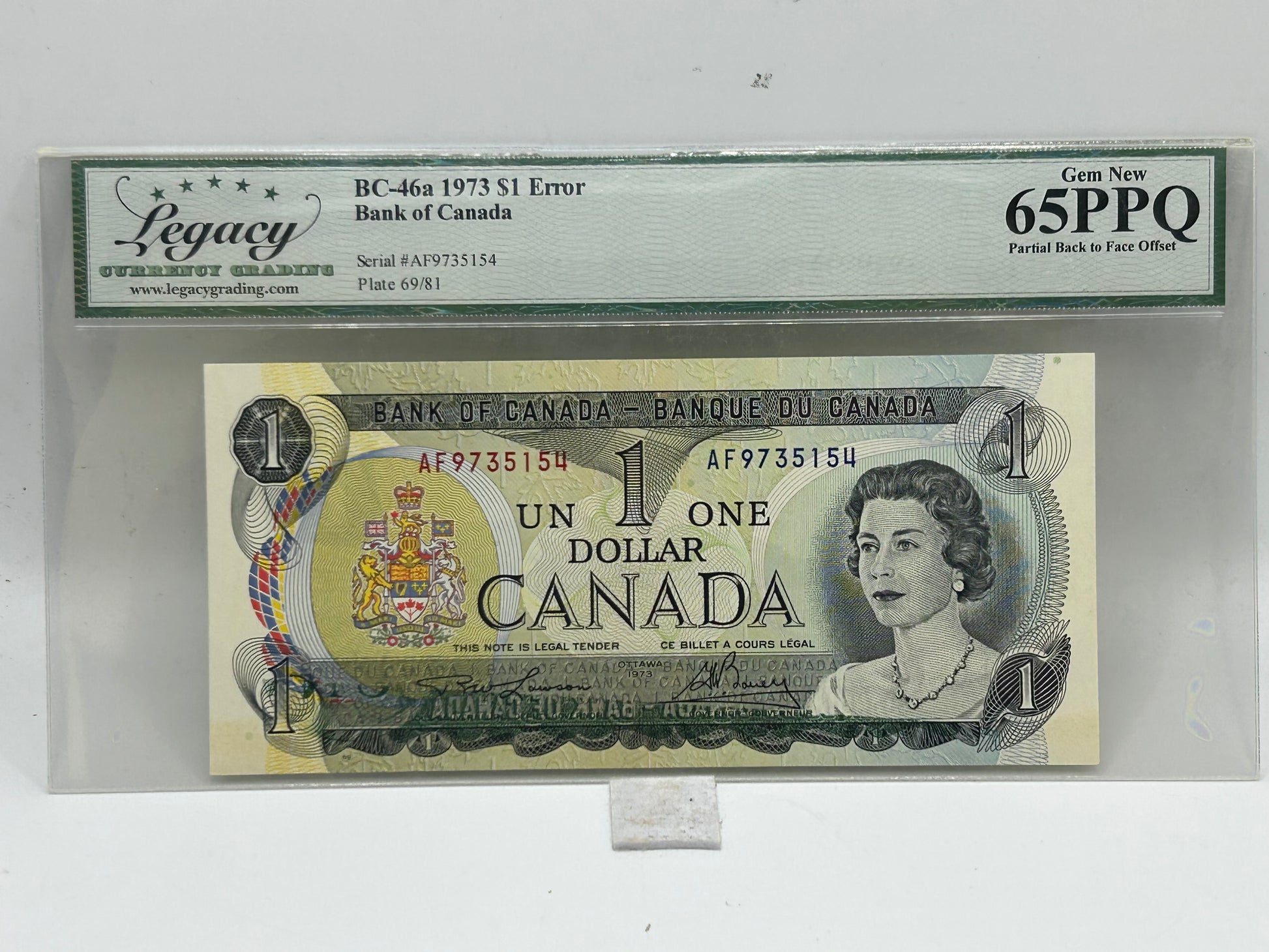 1973 Bank of Canada $1 Error BC-46a Lawson-Bouey Partial Back to Face Offset Legacy Gem New 65PPQ - Obverse